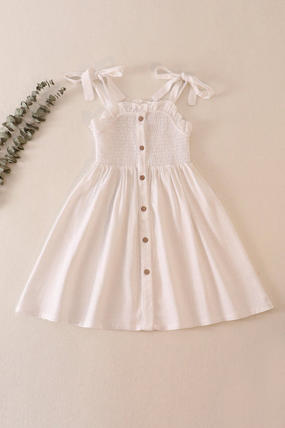 White linen smocked button dress