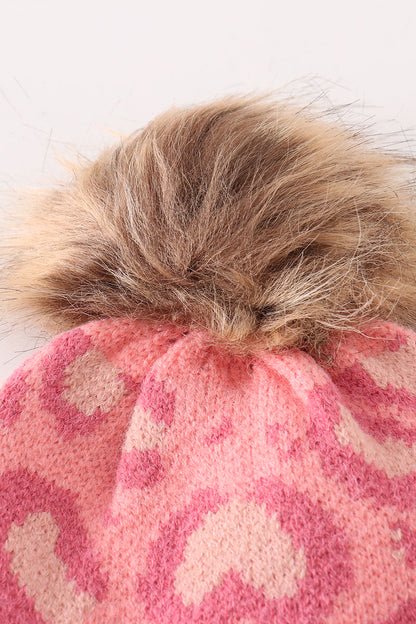 Pink pompom leopard cable beanie